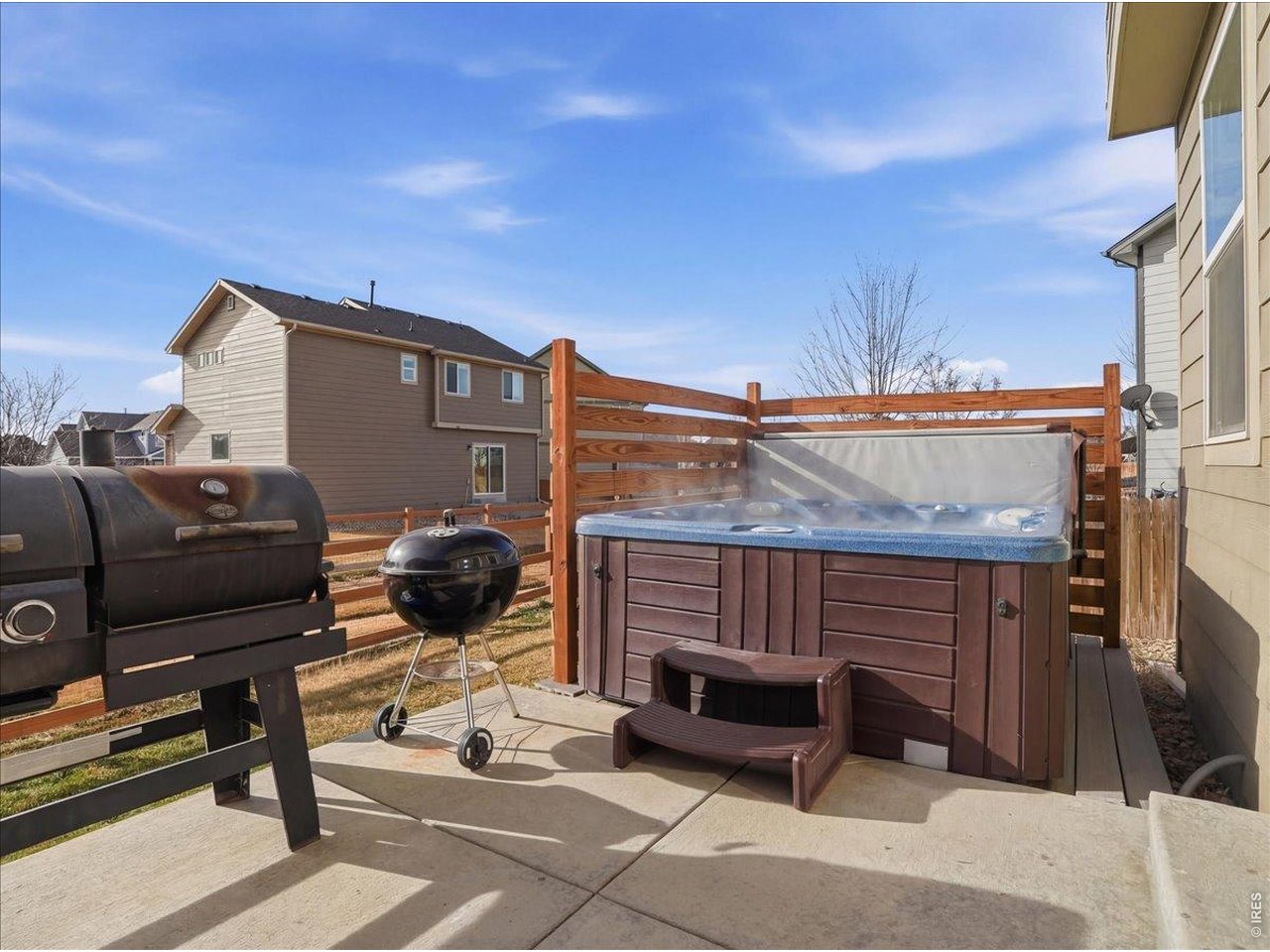 1565 Basildon Court Windsor, CO 80550 - Photo 28 of 36 a view of a terrace with couches and lounge chairs