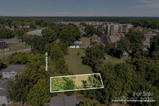 an aerial view of residential house with outdoor space