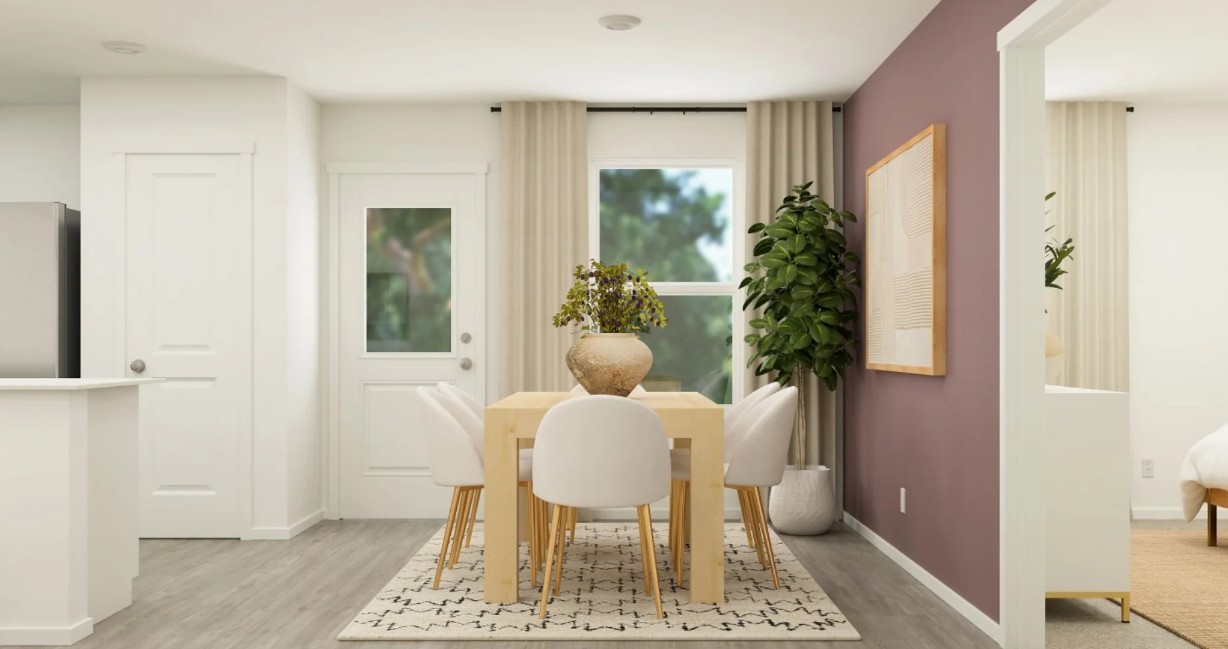 2209 Jeter Drive Bryan, TX 77807 - Photo 12 of 24 a view of a dining room with furniture and a potted plant