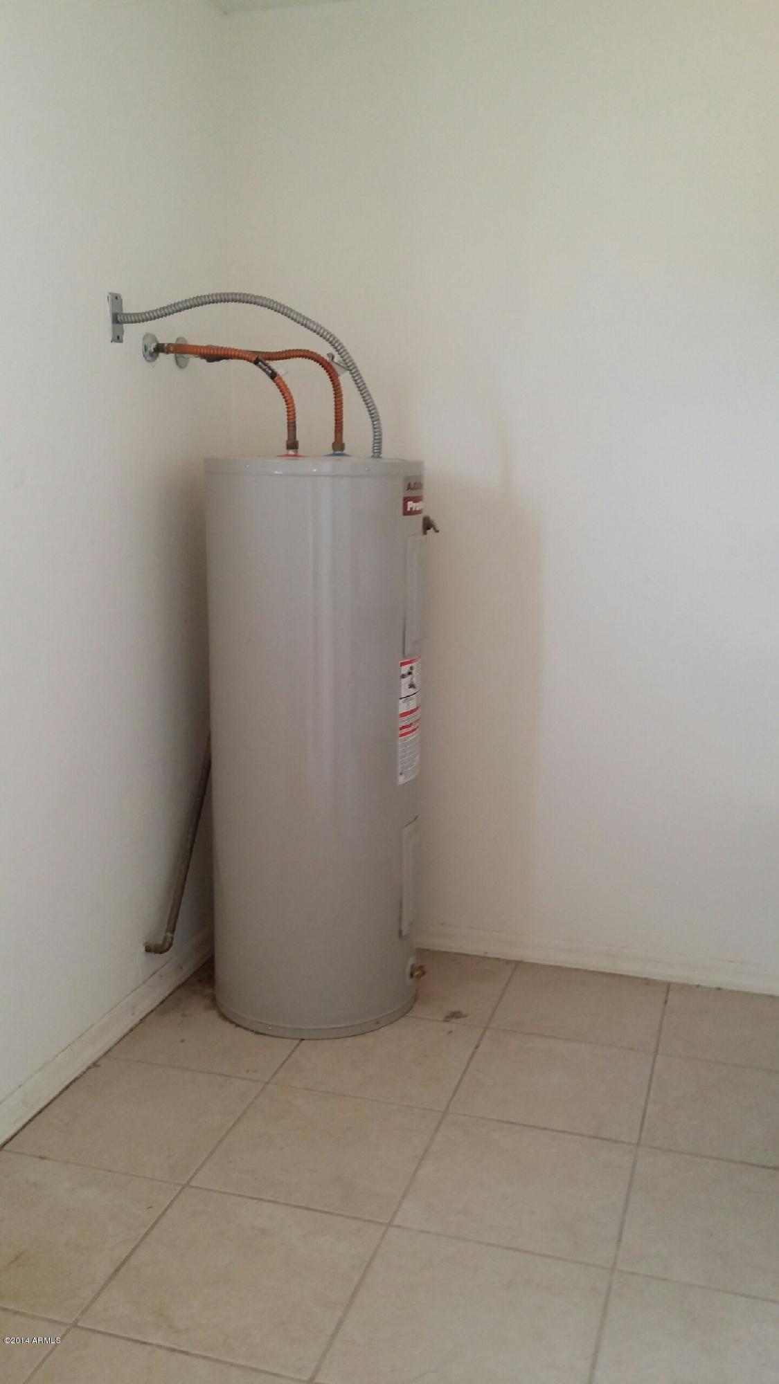 3477 East Batten Road Eloy, AZ 85131 - Photo 1 of 18 Laundry room and water heater room