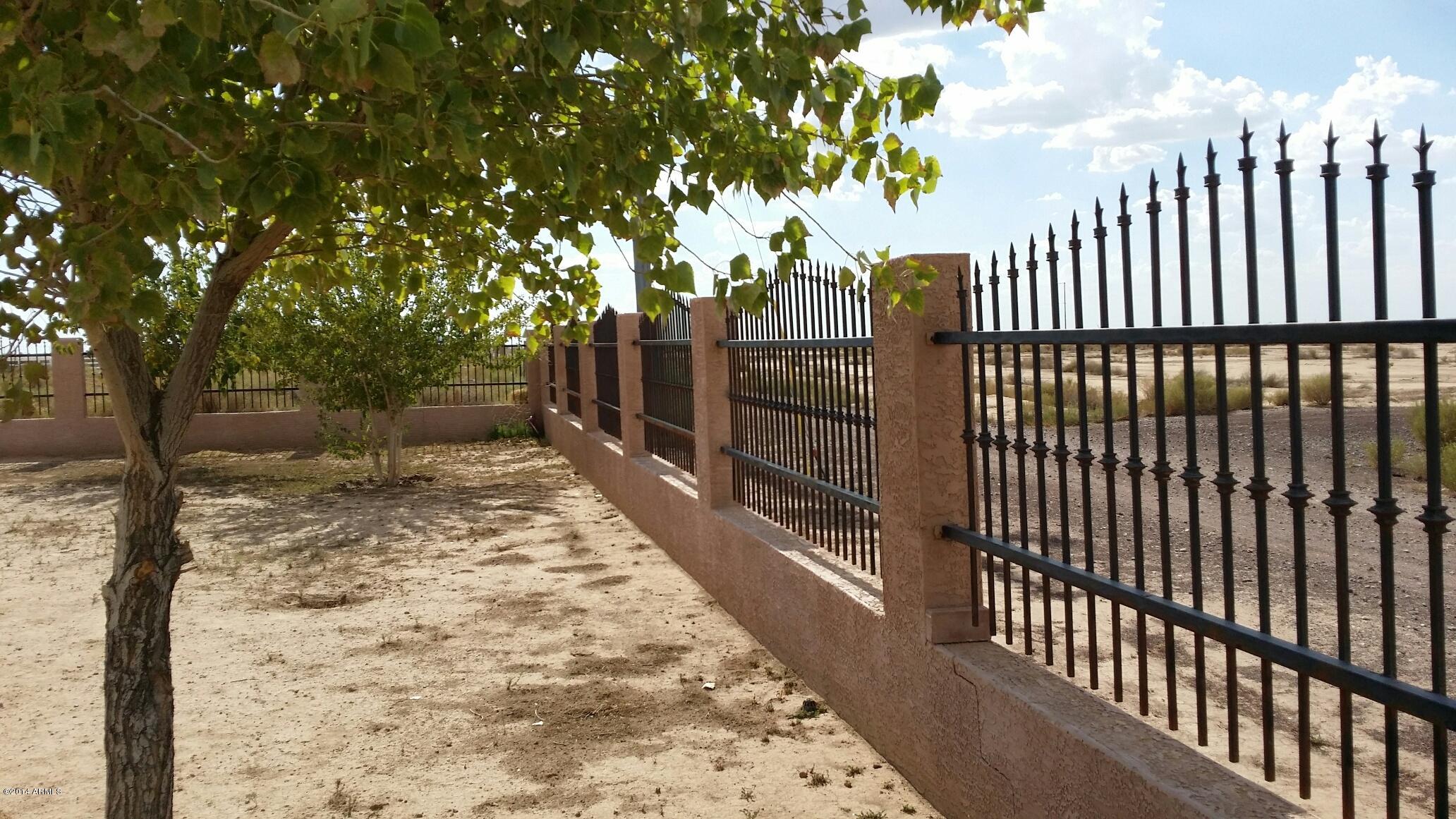 3477 East Batten Road Eloy, AZ 85131 - Photo 9 of 18 Inside front yard showing iron fencing