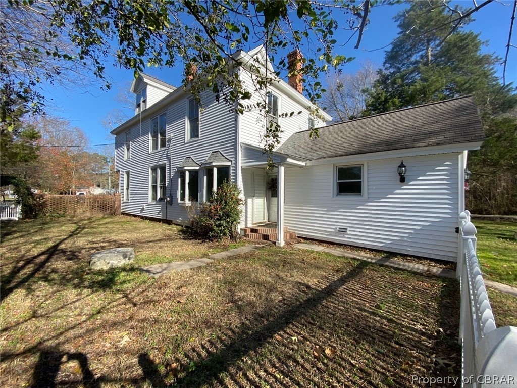 11044 Buckley Hall Road Mathews, VA 23109 - Photo 28 of 34 a view of a house with a yard