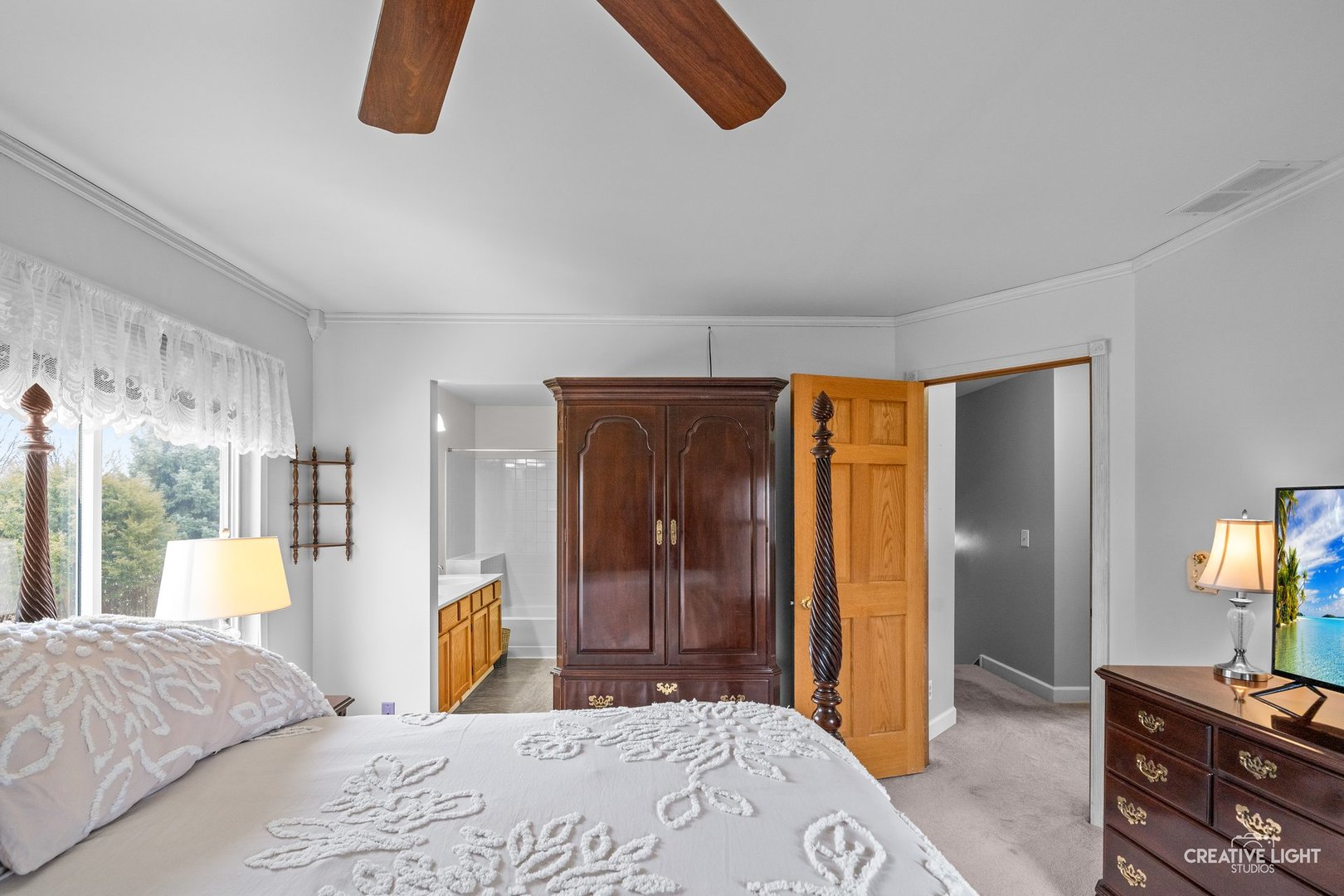 722 Burton Drive Batavia, IL 60510 - Photo 15 of 35 a bedroom with a bed and a dresser in it