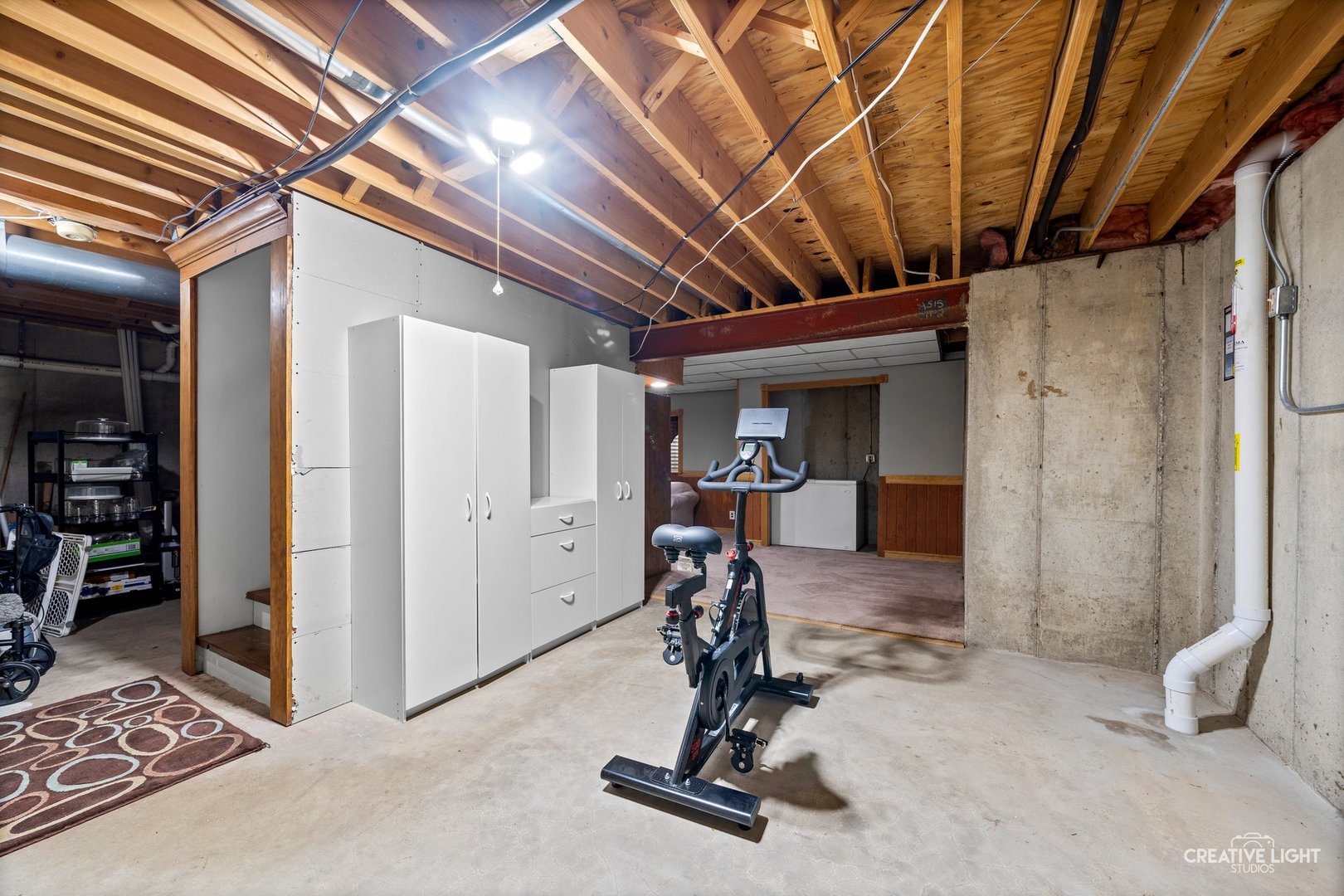 722 Burton Drive Batavia, IL 60510 - Photo 20 of 35 a view of a room with gym equipment