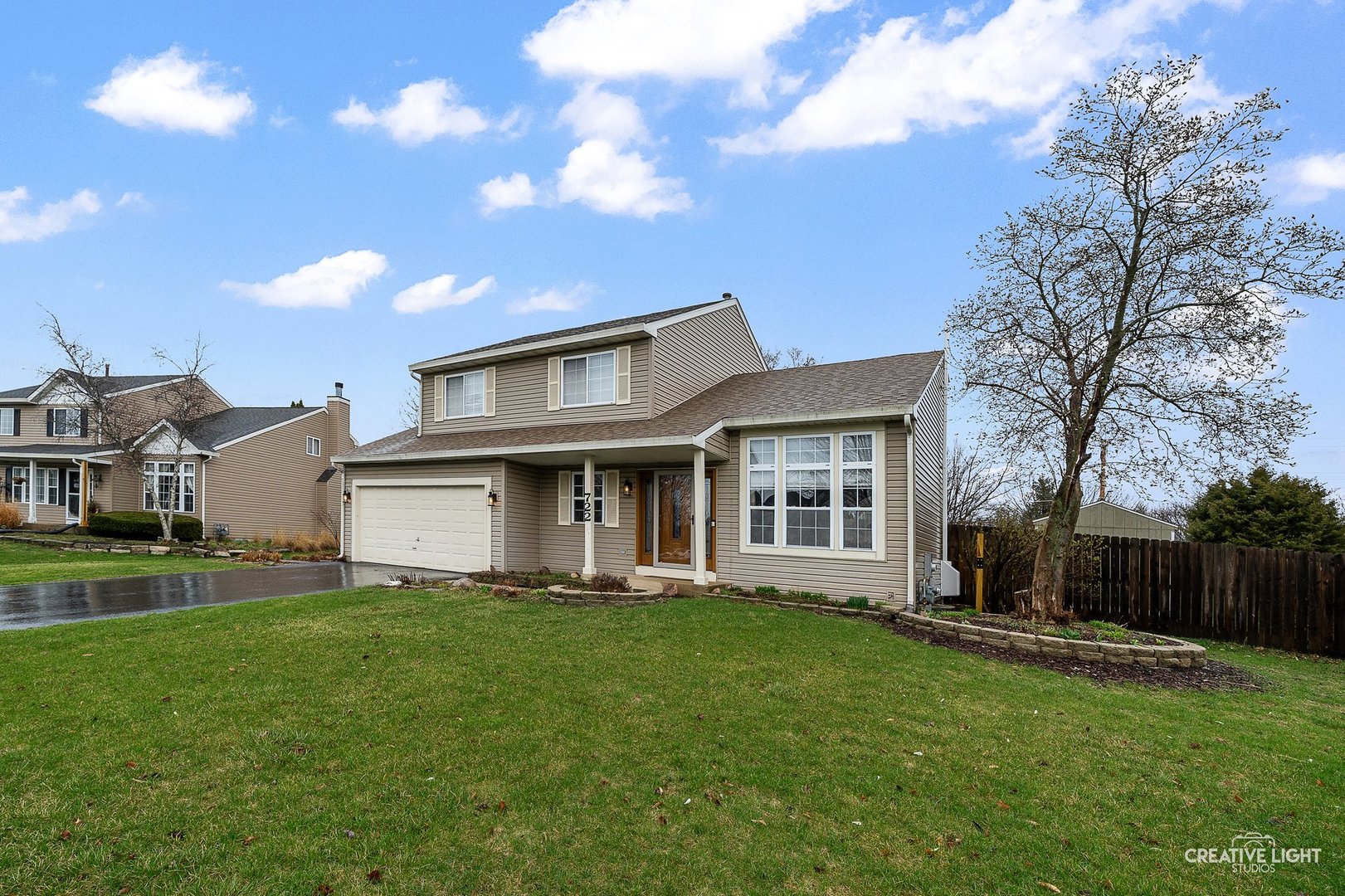 722 Burton Drive Batavia, IL 60510 - Photo 2 of 35 a front view of house with yard and green space