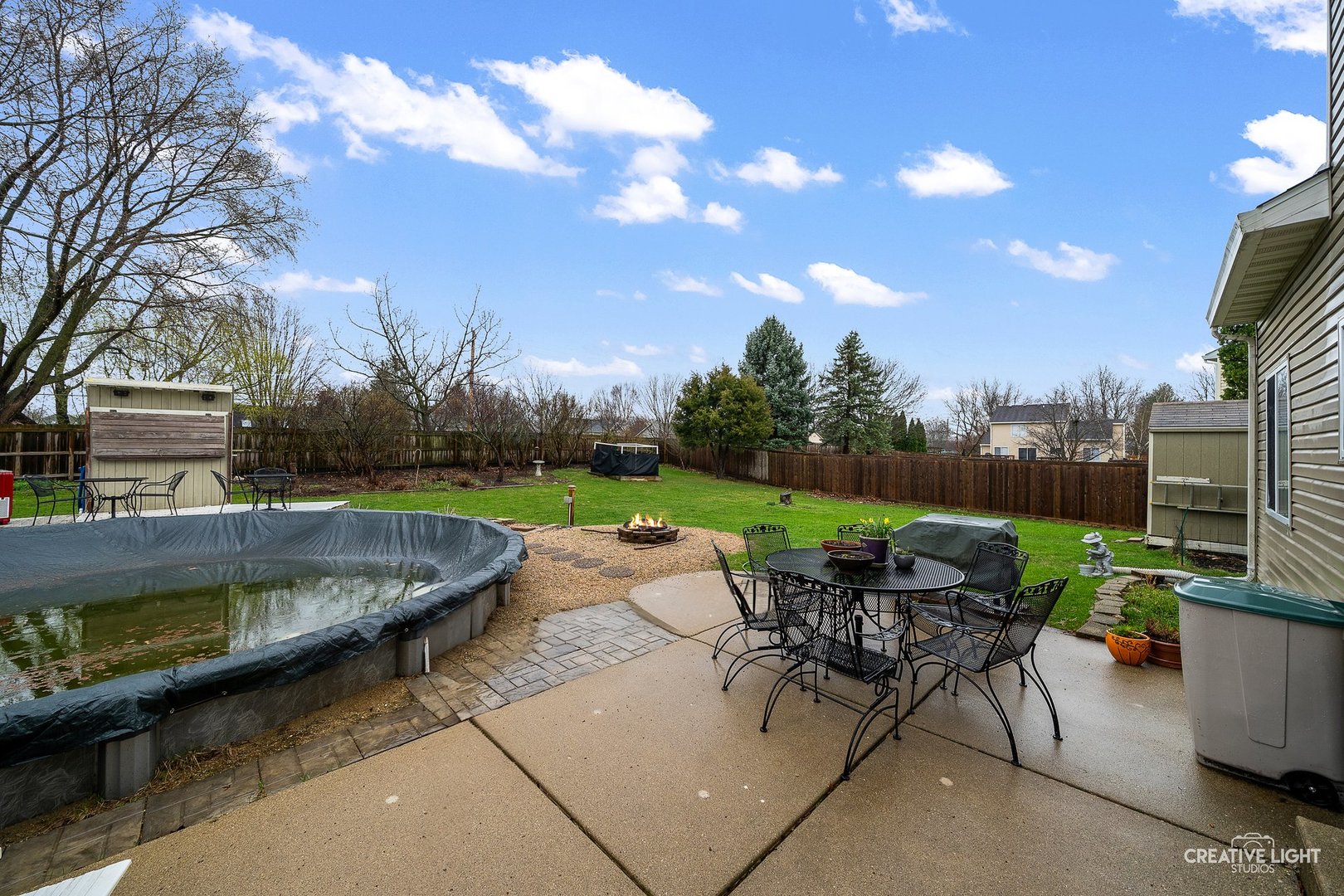 722 Burton Drive Batavia, IL 60510 - Photo 25 of 35 a view of a patio with a yard