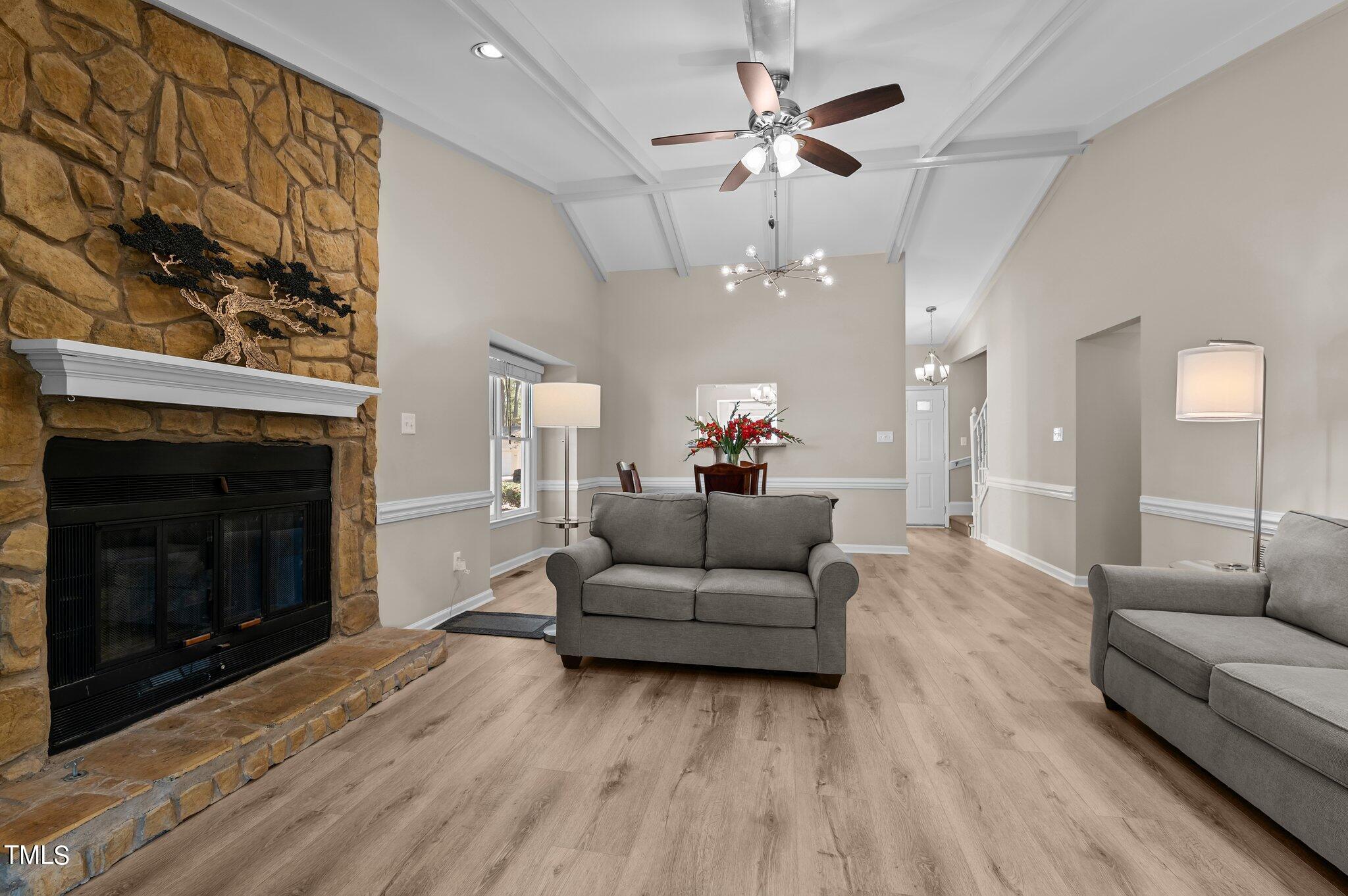 1503 Nature Court Raleigh, NC 27609 - Photo 12 of 36 a living room with furniture and a fireplace