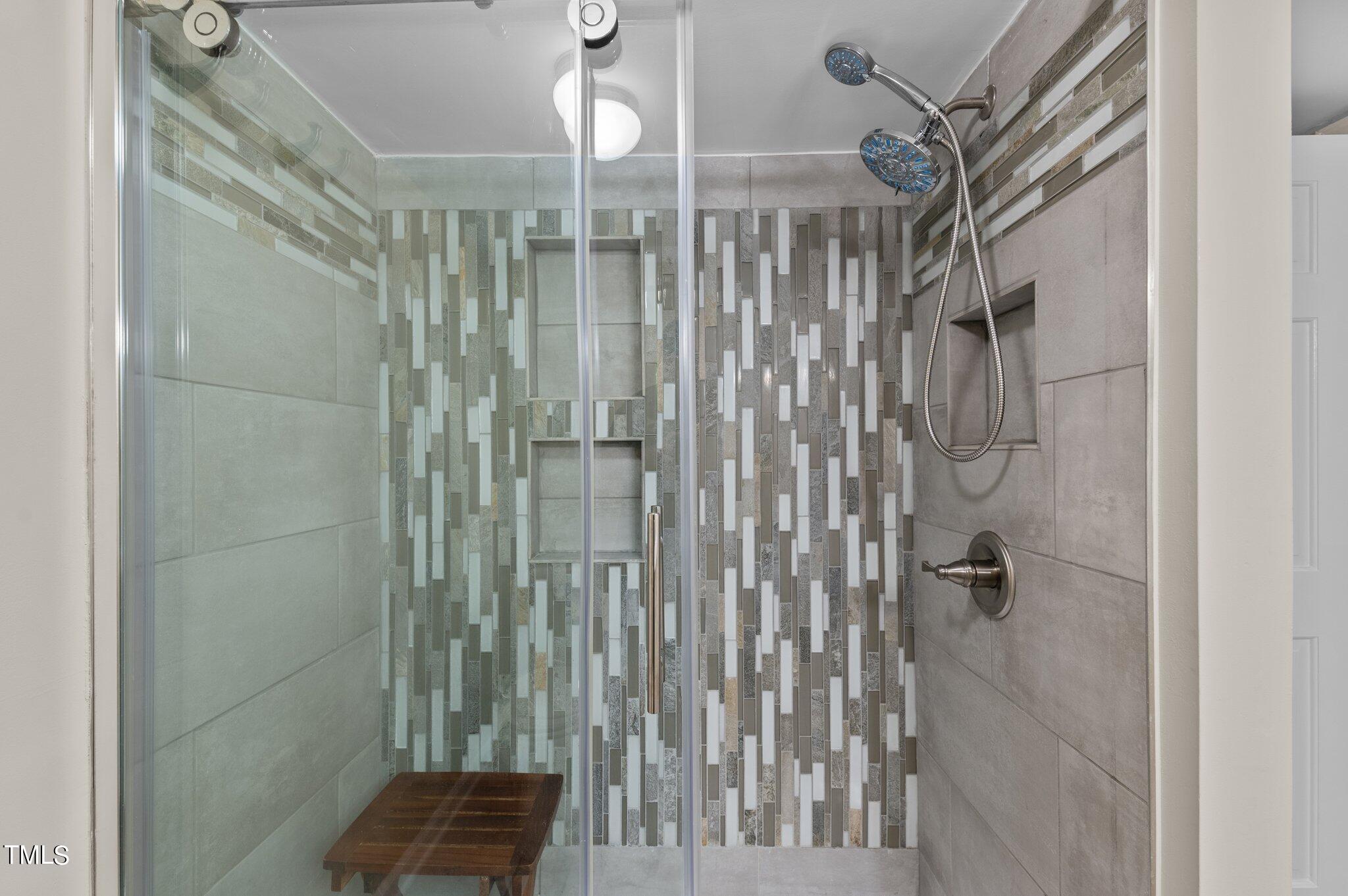 1503 Nature Court Raleigh, NC 27609 - Photo 25 of 36 a bathroom with a shower