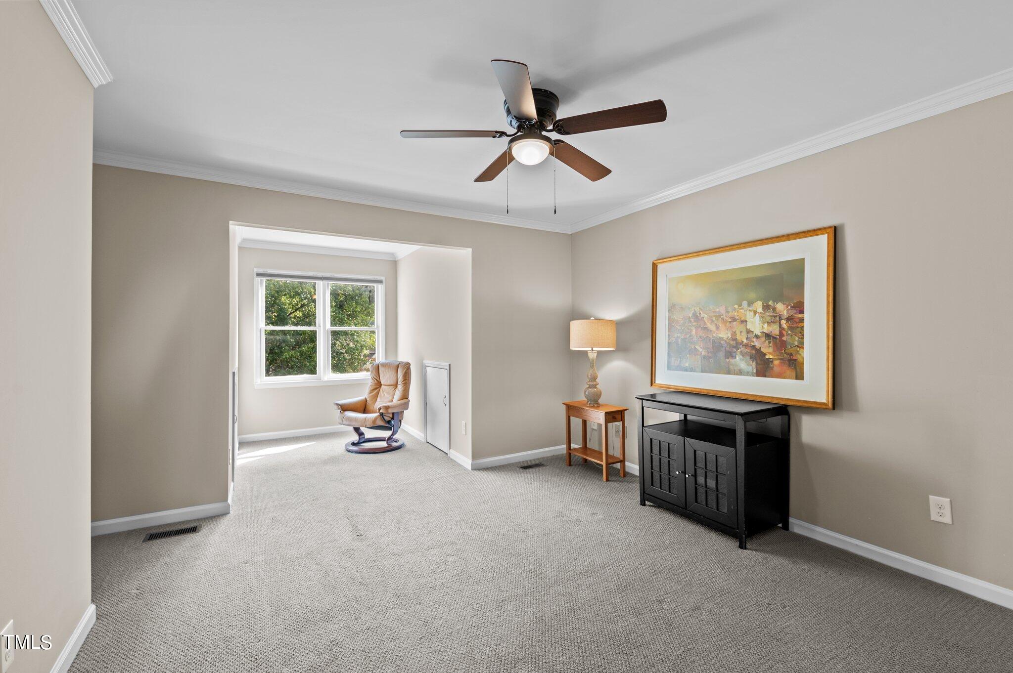 1503 Nature Court Raleigh, NC 27609 - Photo 29 of 36 a living room with furniture and a window