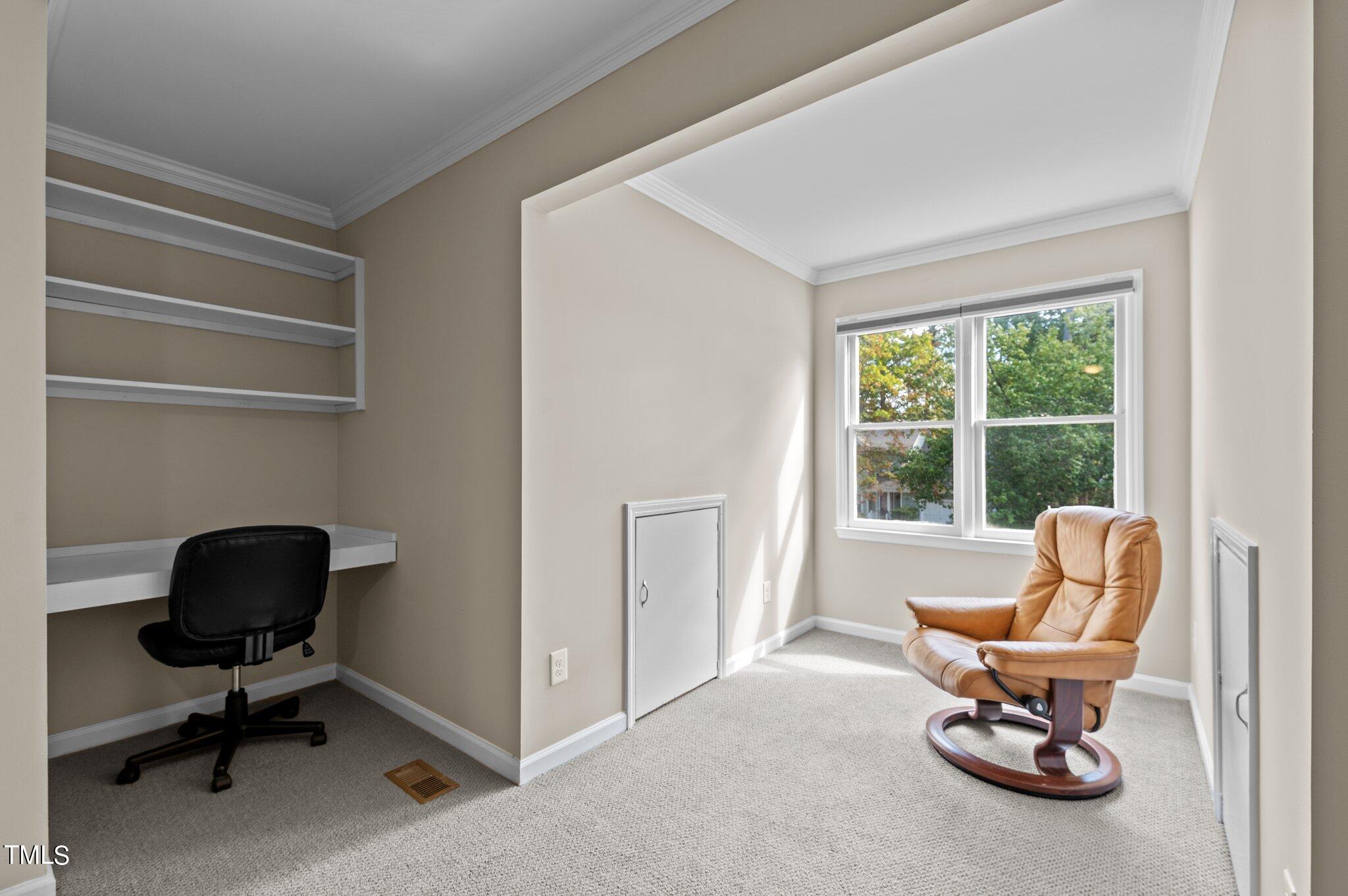 1503 Nature Court Raleigh, NC 27609 - Photo 30 of 36 a living room with furniture and a window