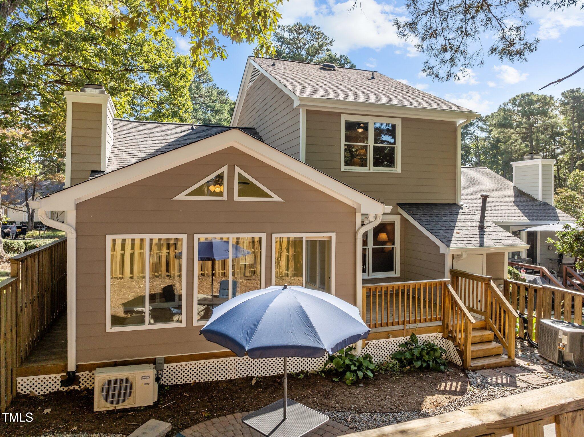 1503 Nature Court Raleigh, NC 27609 - Photo 4 of 36 a front view of a house with yard