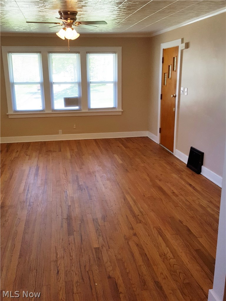 1896 Faye Road Akron, OH 44306 - Photo 10 of 24 Original oak wood flooring in living room.