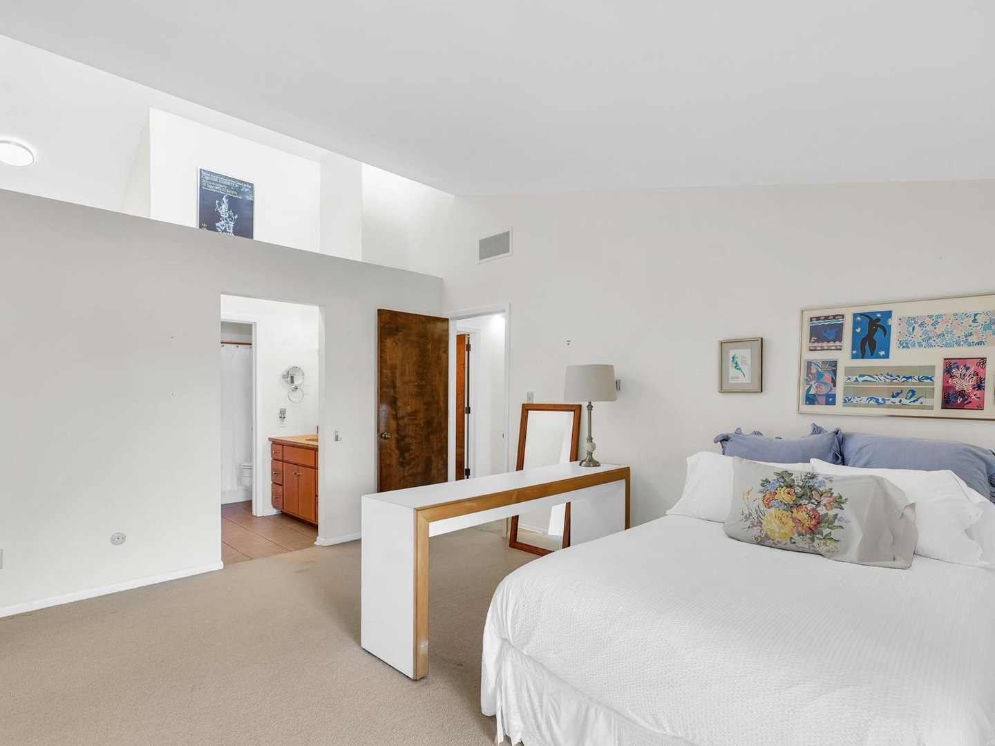 107 North Elm Street, Unit 310 Champaign, IL 61820 - Photo 20 of 34 a bedroom with a bed and window