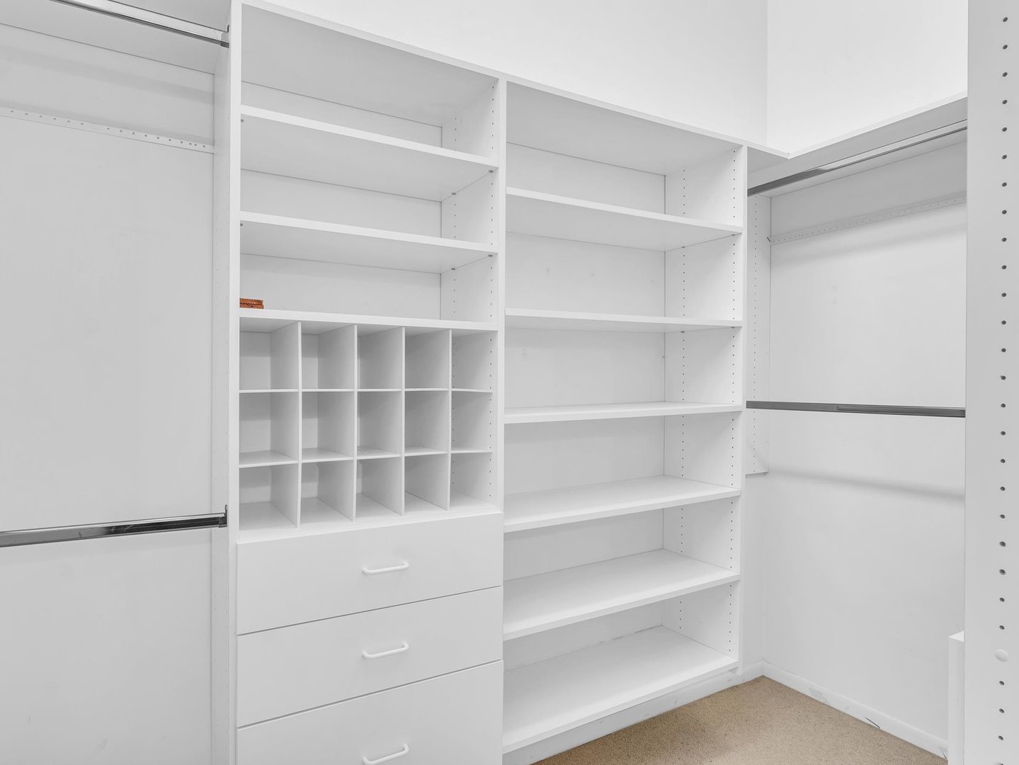 107 North Elm Street, Unit 310 Champaign, IL 61820 - Photo 23 of 34 a view of an empty walk in closet