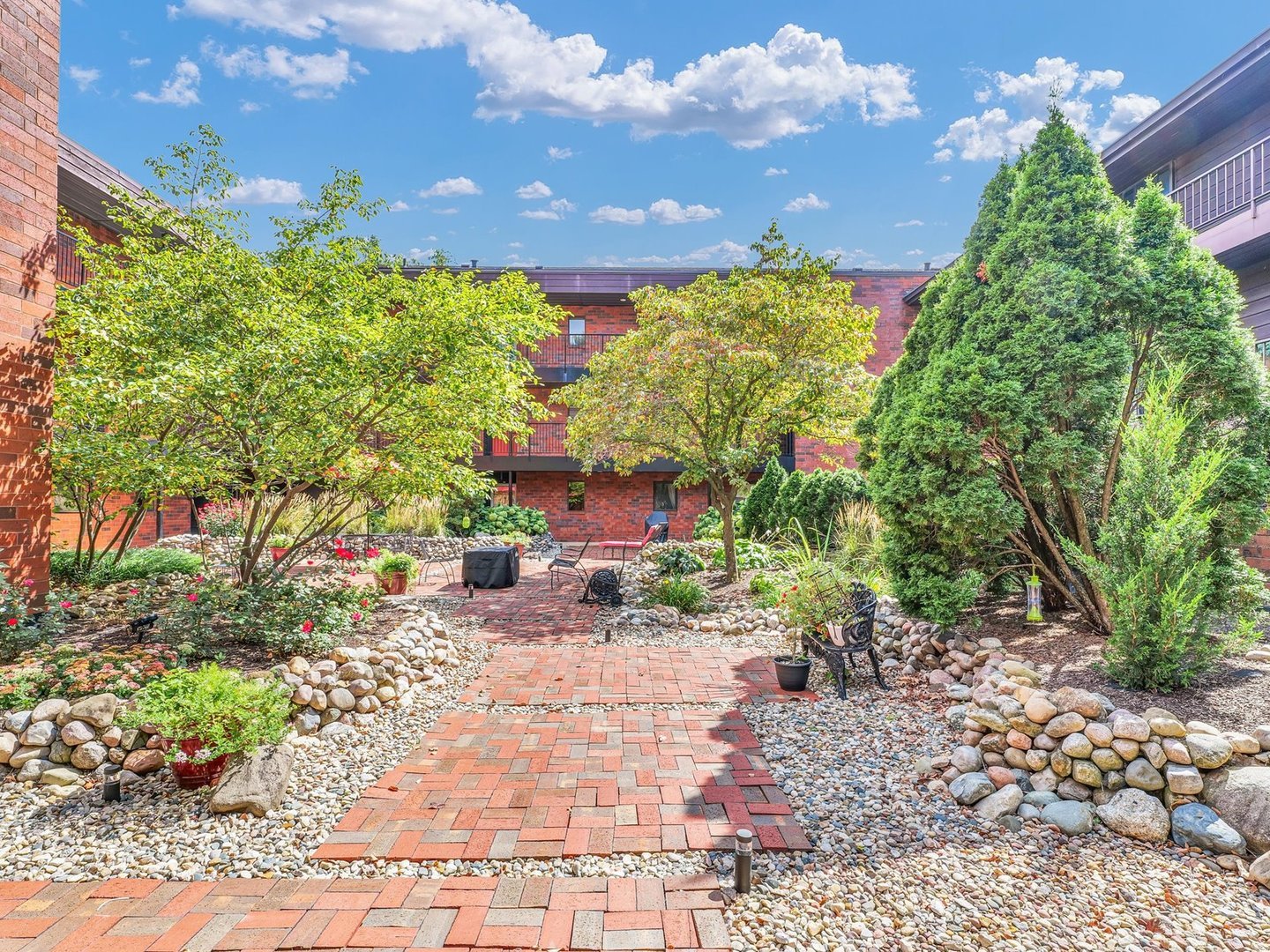 107 North Elm Street, Unit 310 Champaign, IL 61820 - Photo 30 of 34 a view of a garden