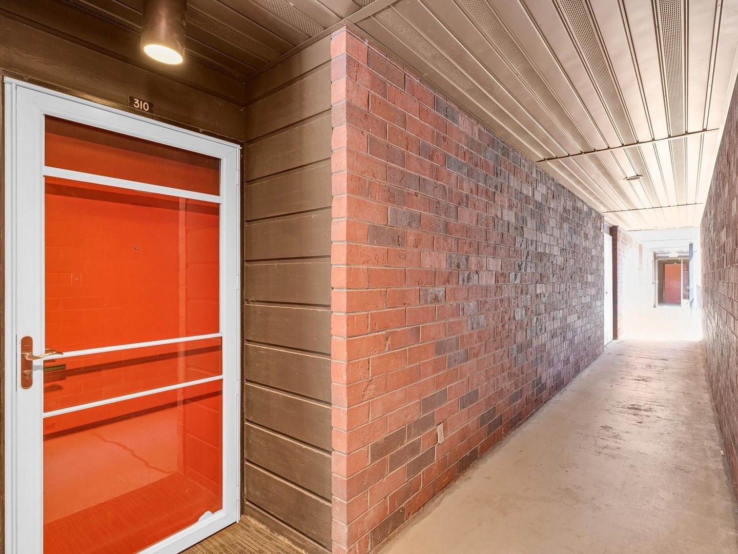 107 North Elm Street, Unit 310 Champaign, IL 61820 - Photo 3 of 34 a view of a wooden door