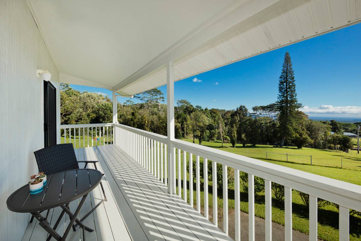 602 Hoaka Road Hilo, HI 96720 - Photo 17 of 30 a view of a chair and tables in the balcony