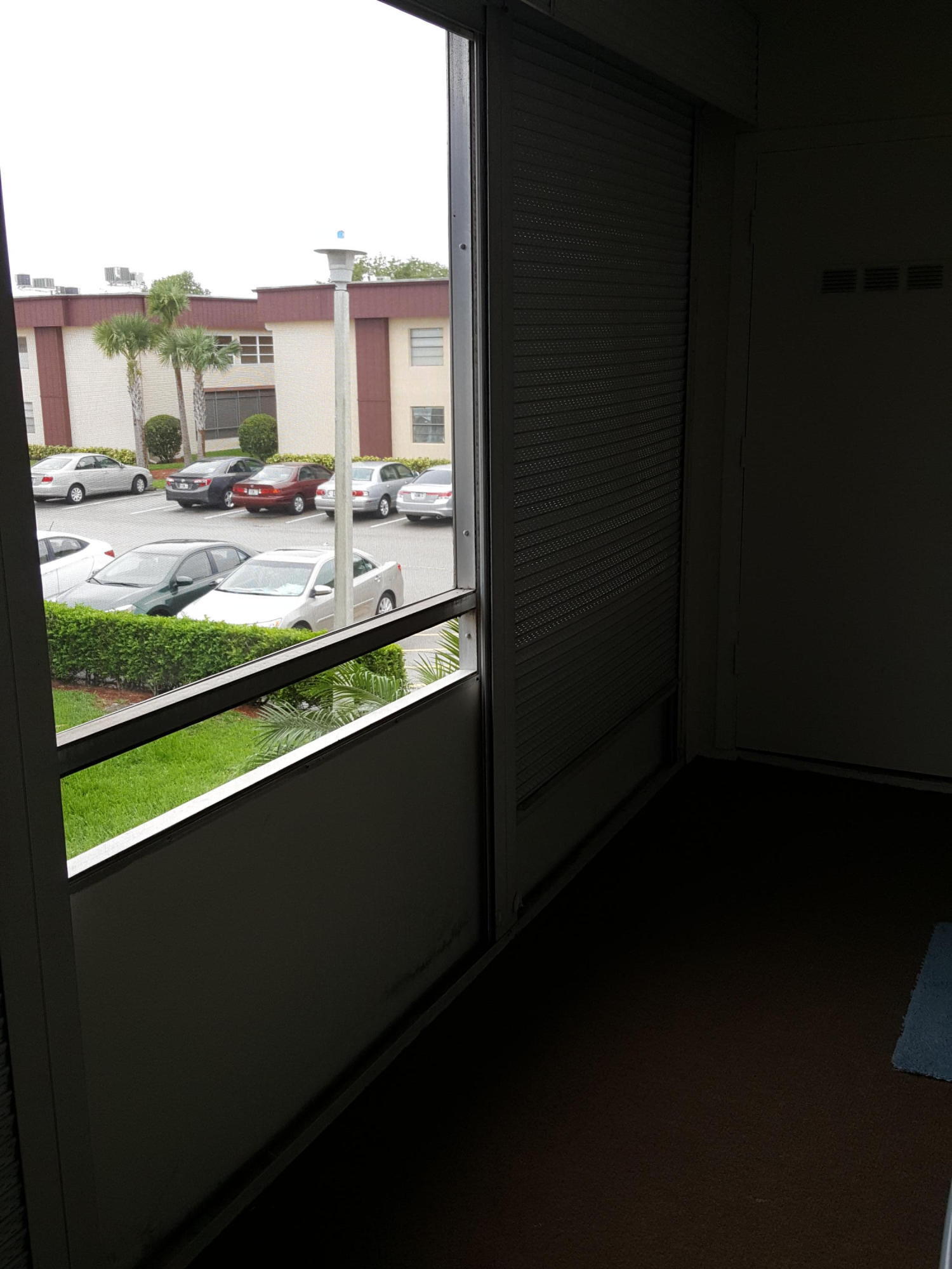 83 Capri B, Unit 83 Delray Beach, FL 33484 - Photo 21 of 26 a view of swimming pool from a balcony