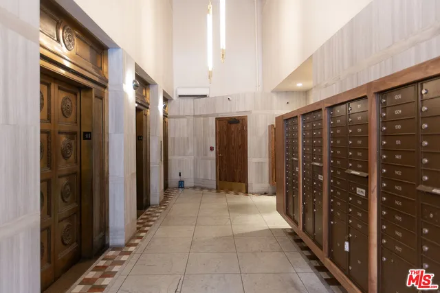 a view of hallway with balcony