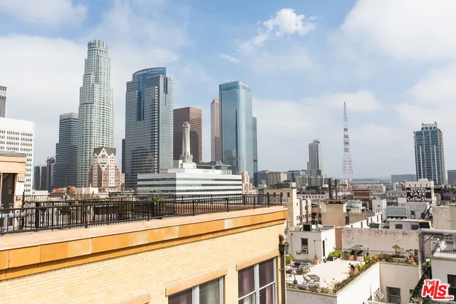 a view of a city with tall buildings