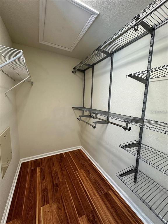 4500 Southwest 52nd Circle, Unit 106 Ocala, FL 34474 - Photo 17 of 30 a view of a room with wooden floor