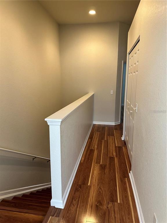 4500 Southwest 52nd Circle, Unit 106 Ocala, FL 34474 - Photo 24 of 30 a view of wooden floor