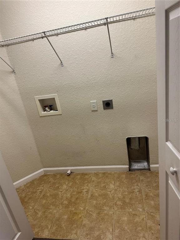 4500 Southwest 52nd Circle, Unit 106 Ocala, FL 34474 - Photo 25 of 30 a view of a room with racks on the wall