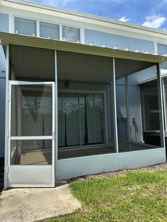 4500 Southwest 52nd Circle, Unit 106 Ocala, FL 34474 - Photo 28 of 30 a view of a house with a large window