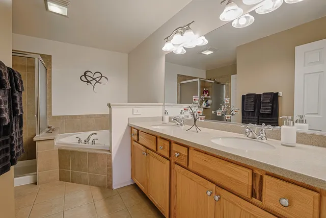 a bathroom with a sink a vanity and a mirror