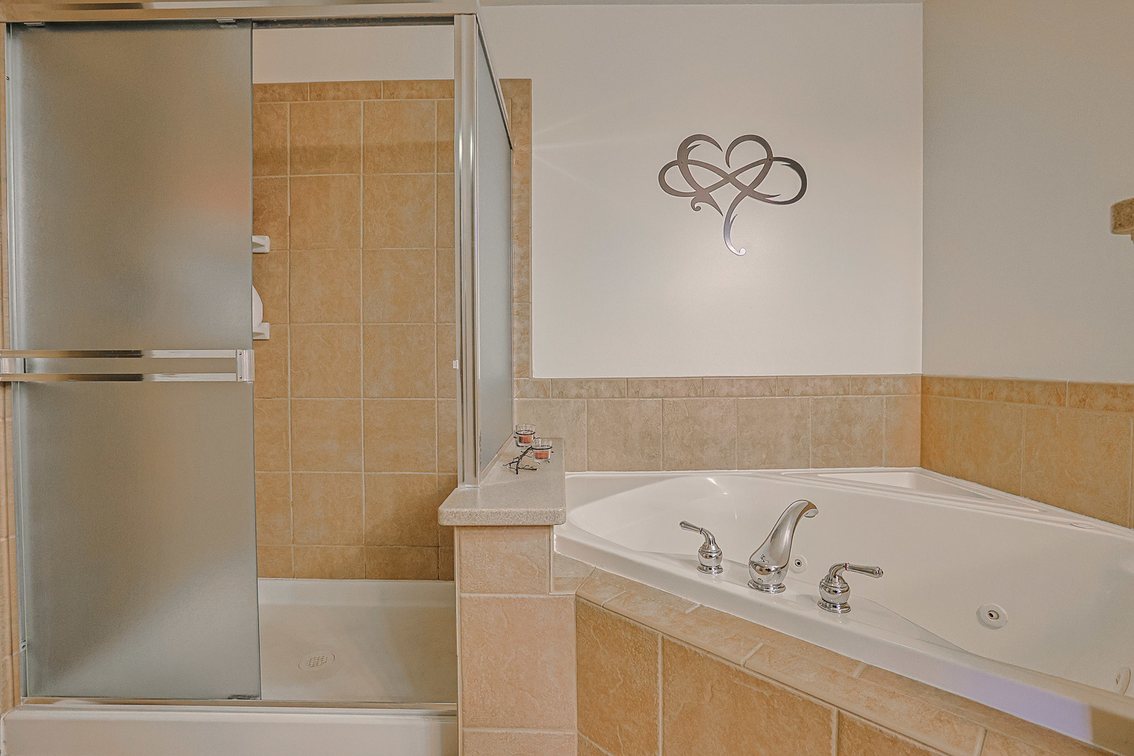 1242 Prairie View Parkway Cary, IL 60013 - Photo 26 of 36 a bathroom with a bathtub and a shower