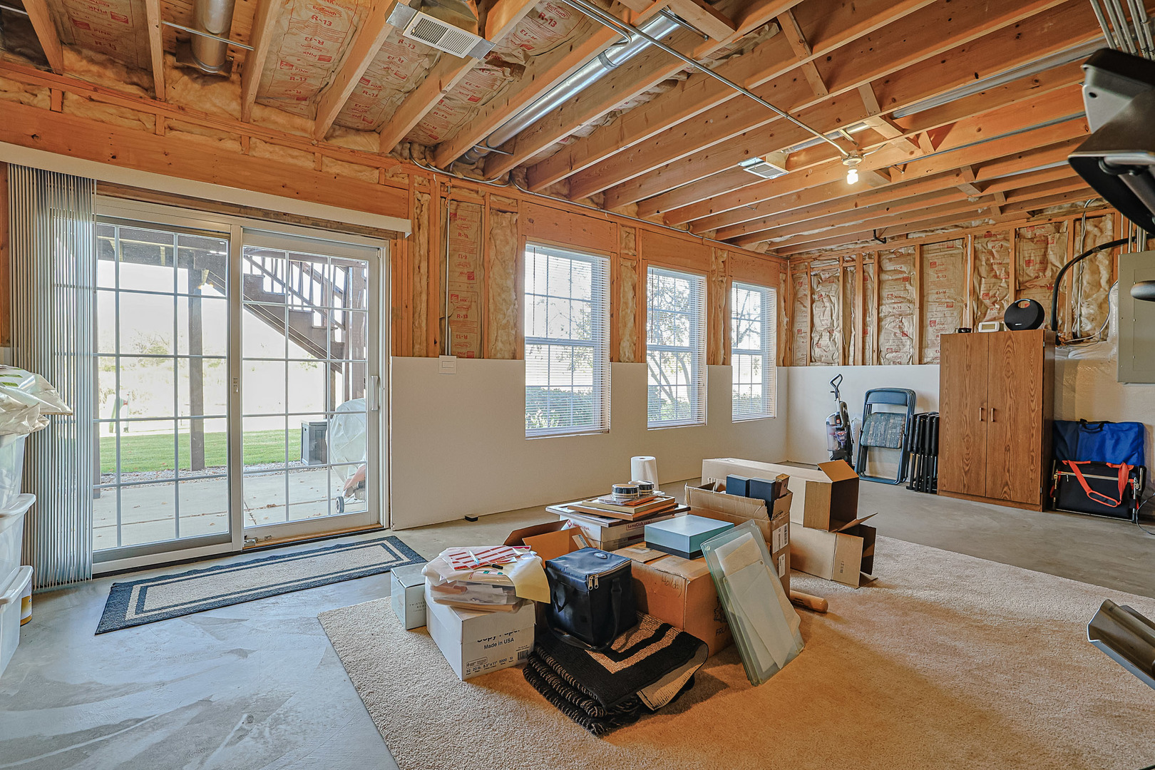 1242 Prairie View Parkway Cary, IL 60013 - Photo 27 of 36 a living room with furniture and large windows
