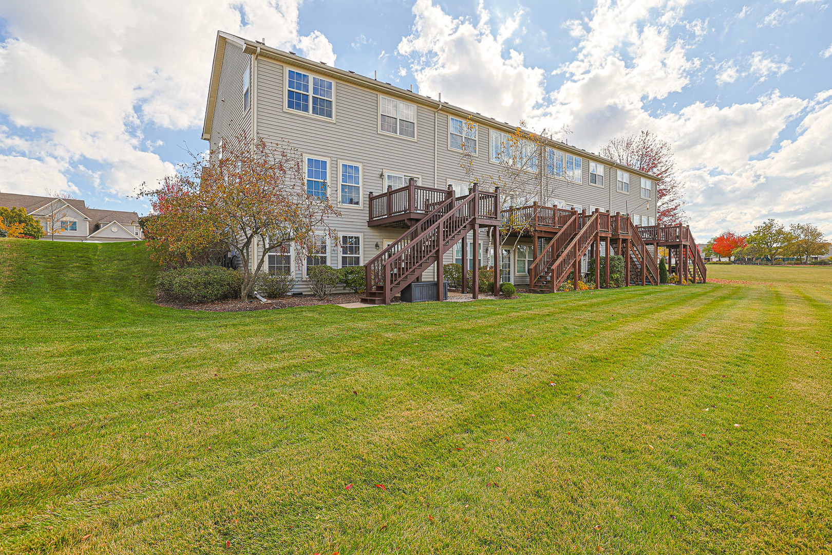1242 Prairie View Parkway Cary, IL 60013 - Photo 32 of 36 a view of a house with backyard