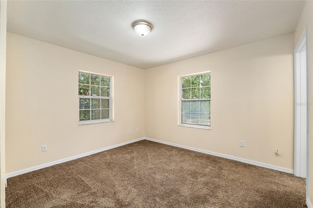 4329 Northwest 155th Street Reddick, FL 32686 - Photo 29 of 52 an empty room with a window