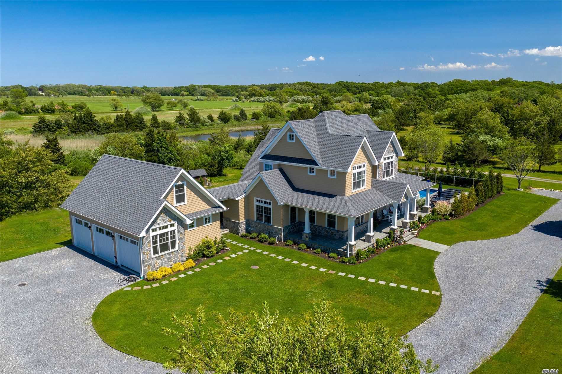 325 Wells Road Peconic, NY 11958 - Photo 19 of 20 garage with loft