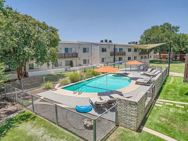 a view of a yard with a trees