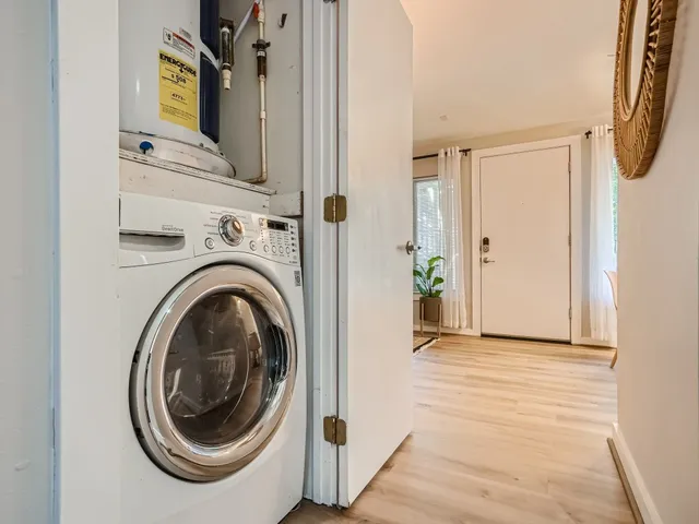 a view of a storage & utility room with washer and dryer