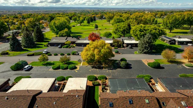 an aerial view of a house with a garden