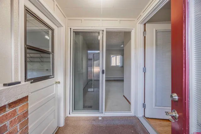 a view of a kitchen counter space and window