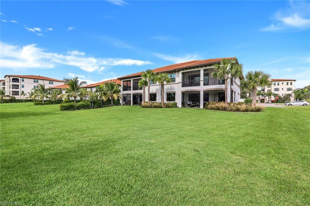16348 Viansa Way, Unit 101 Naples, FL 34110 - Photo 23 of 34 Private lanai opens large grassy area