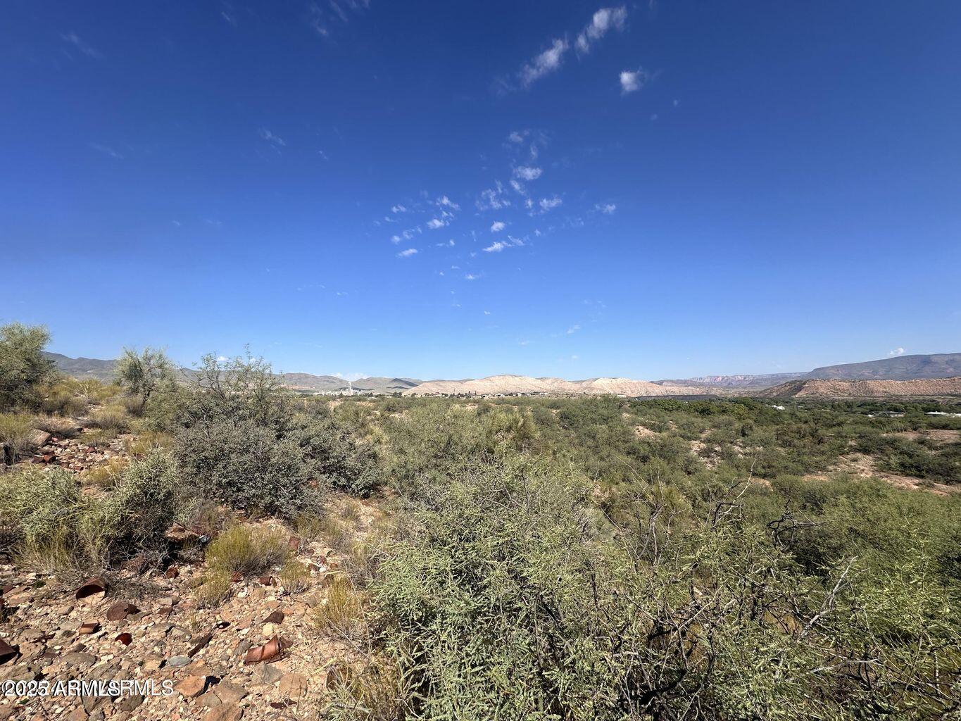 3 Randall Road Clarkdale, AZ 86324 - Photo 7 of 10 a view of a room with mountains in the background