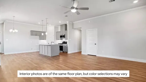 a open kitchen with stainless steel appliances granite countertop a sink refrigerator and cabinets