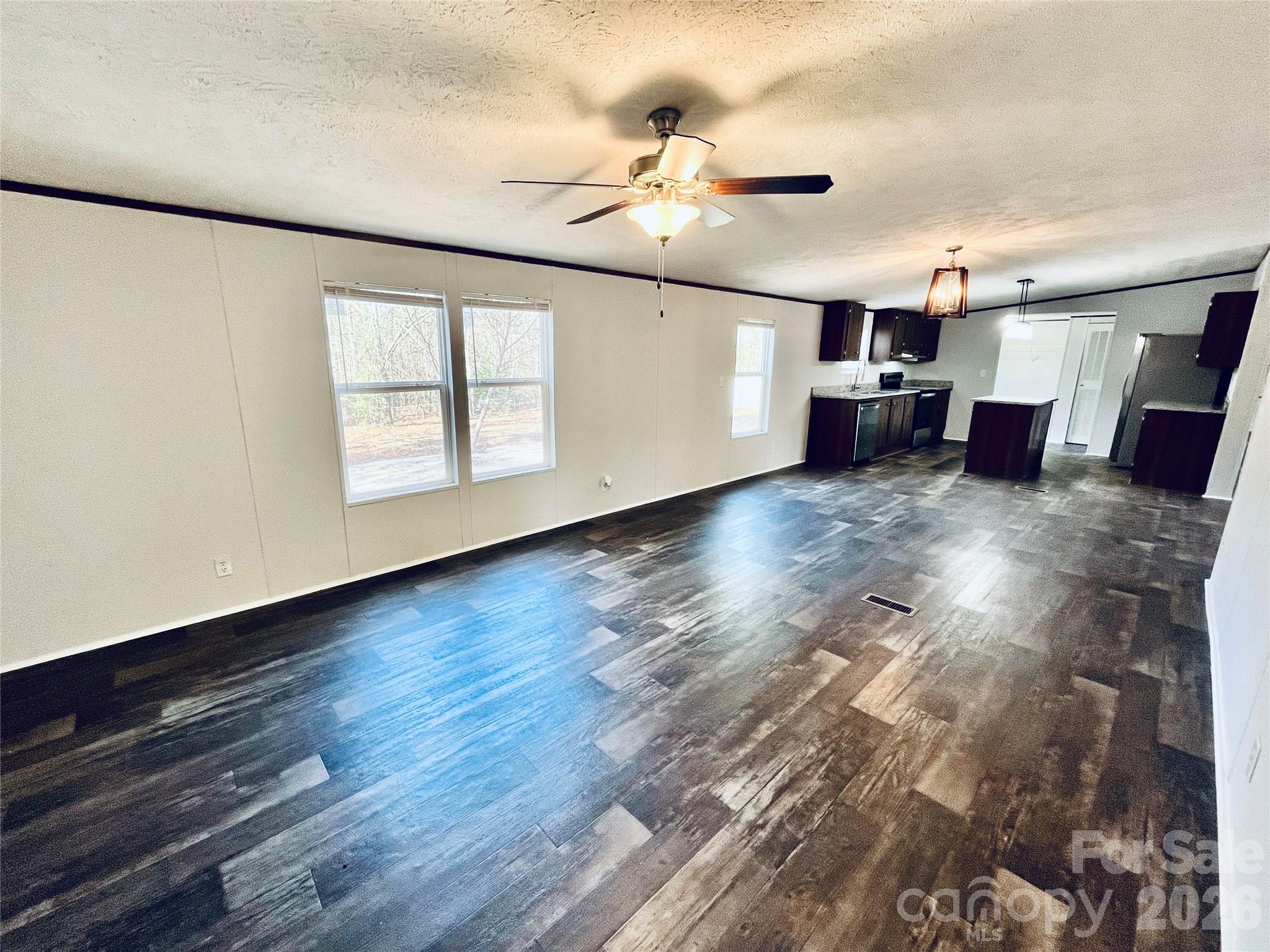 491 Sandy Springs Lane Lexington, SC 29073 - Photo 19 of 36 a view of empty room with wooden floor