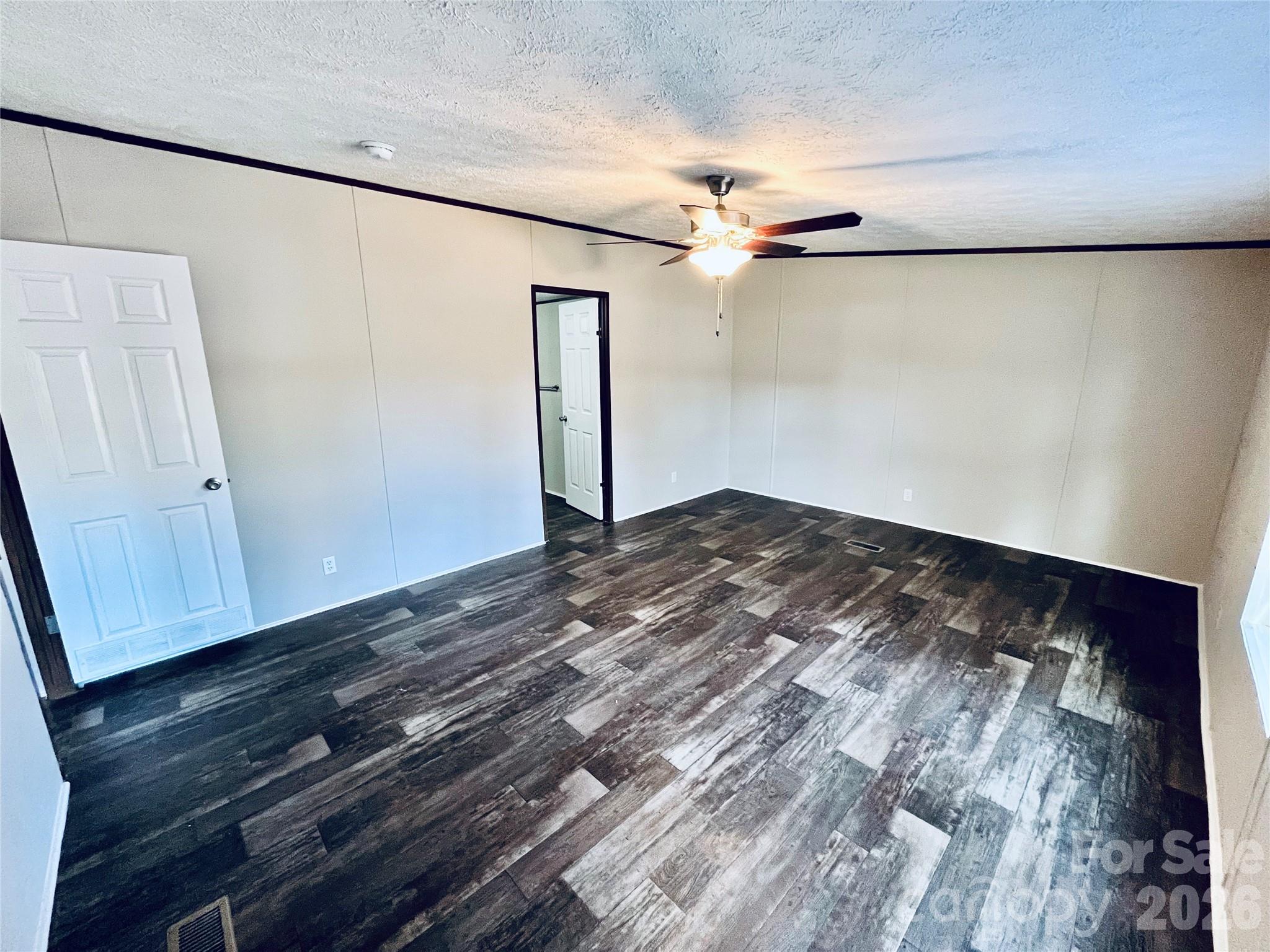 491 Sandy Springs Lane Lexington, SC 29073 - Photo 25 of 36 wooden floor in an empty room
