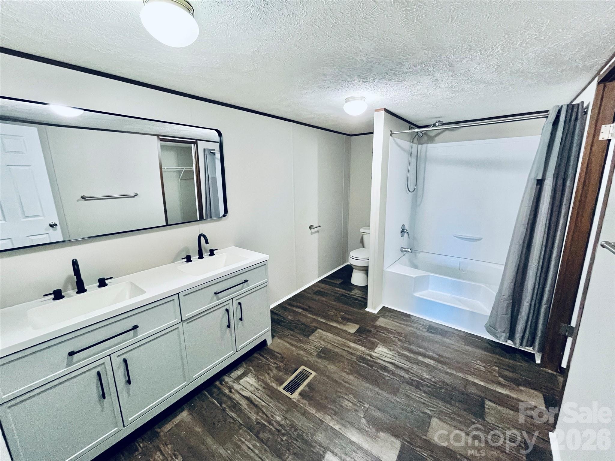 491 Sandy Springs Lane Lexington, SC 29073 - Photo 26 of 36 a bathroom with a double vanity sink and mirror