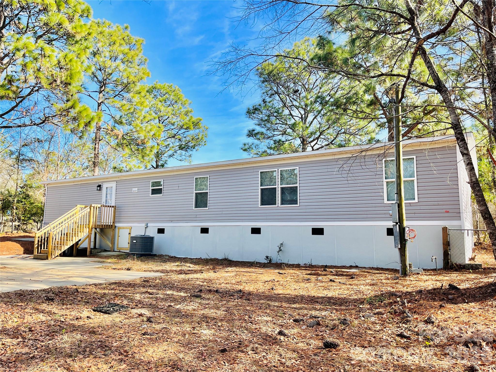 491 Sandy Springs Lane Lexington, SC 29073 - Photo 34 of 36 a view of a house with a yard