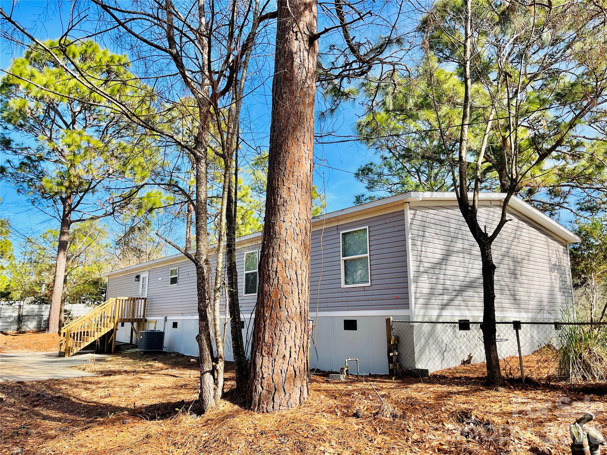 491 Sandy Springs Lane Lexington, SC 29073 - Photo 35 of 36 a front view of a house with a yard