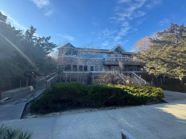 a view of a house with a garden