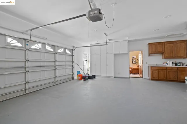 a view of a livingroom with furniture and a potted plant