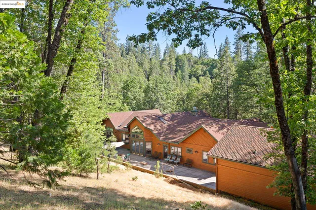 a spacious bathroom with a granite countertop sink mirror and a
