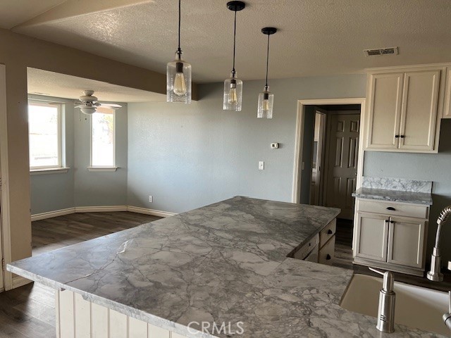 9951 Arrowhead Road Phelan, CA 92371 - Photo 11 of 21 a view of kitchen and hall with wooden floor